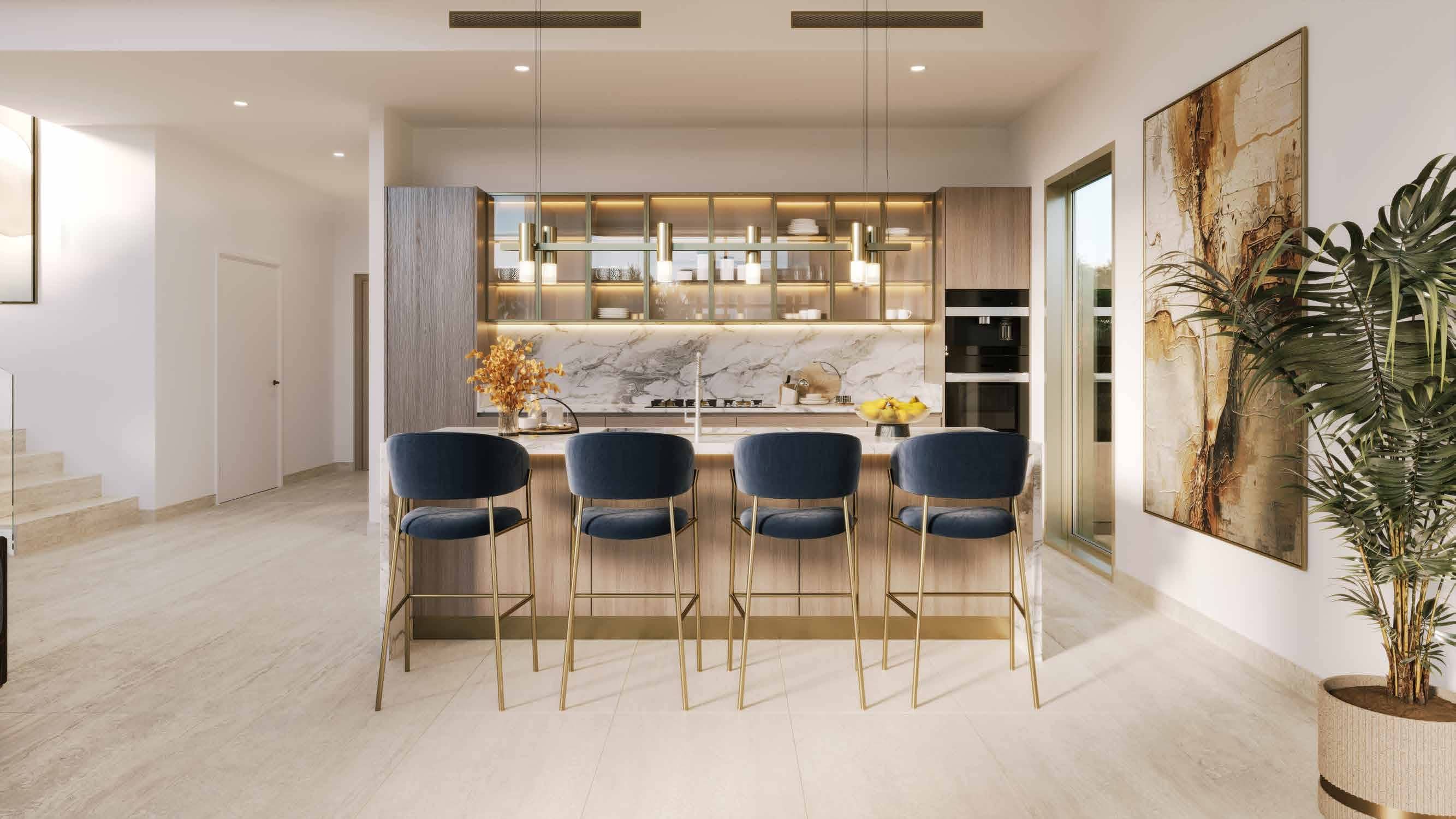 Stylish kitchen and dining area at Manchester City Yas Residences on Yas Island, Abu Dhabi with contemporary design.Ya Residences By Ohana Interior (9).jpg